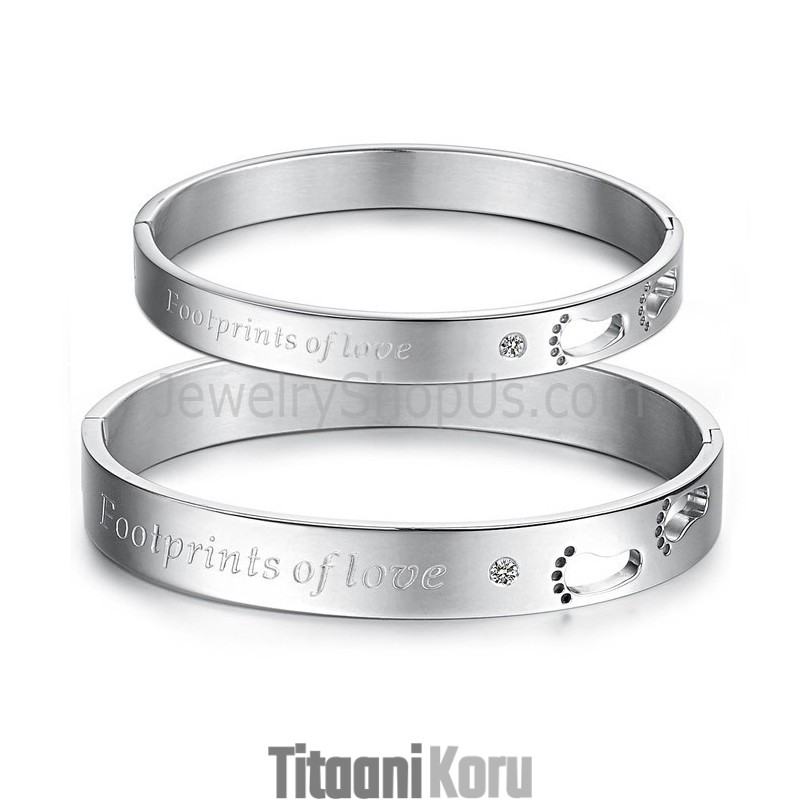 Tatanium "Rakkauden Jalanjäljet" -Rannekorut Pariskunnille Ontoilla Jalanjäljillä Ja Strasseilla C850 Tatanium "Rakkauden Jalanjäljet" -Rannekorut Pariskunnille Ontoilla Jalanjäljillä Ja Strasseilla C850